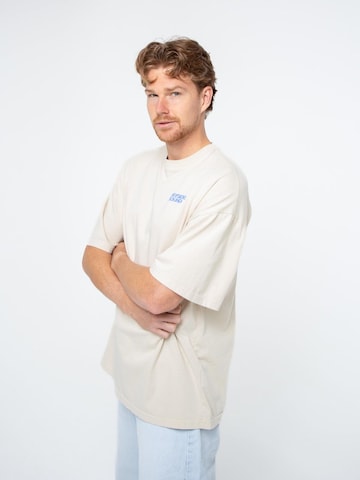 BAYSIDE BOUND Oversizeshirt 'THE RUNNING UNISEX OVERSIZE TEE'‌‌‌‌‌‌ in Beige