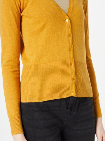 Cardigan King Louie en jaune