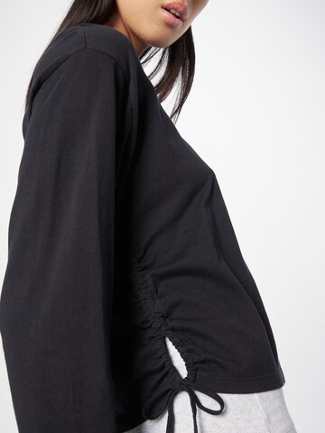 LEVI'S ® - Camiseta 'Graphic Long Sleeve Cinched Tee' en negro