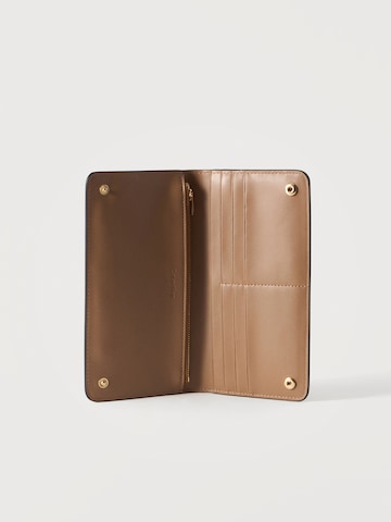Portamonete 'PASSPORT' di Calvin Klein in nero