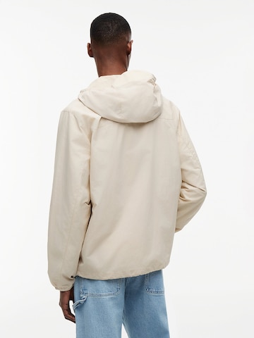 Tommy Jeans Jacke 'Chicago' in Beige