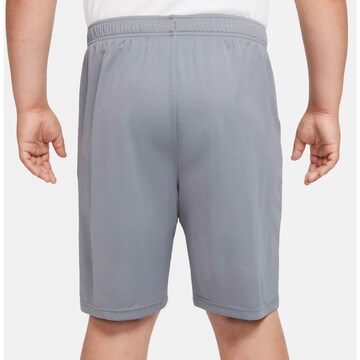 NIKE Regular Workout Pants in Grey