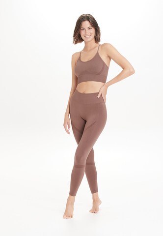 Athlecia Skinny Workout Pants 'NAGAR' in Brown