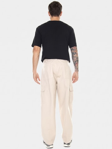 Obey Baggy Hose 'M' Bigwig'‌ in Beige