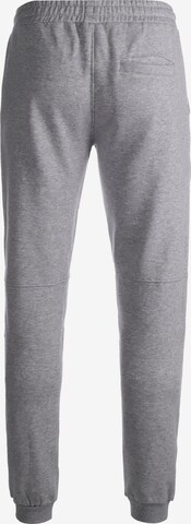 Slimfit Pantaloni sportivi di UMBRO in grigio