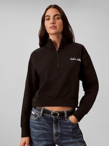 Sweat-shirt Calvin Klein en noir : devant