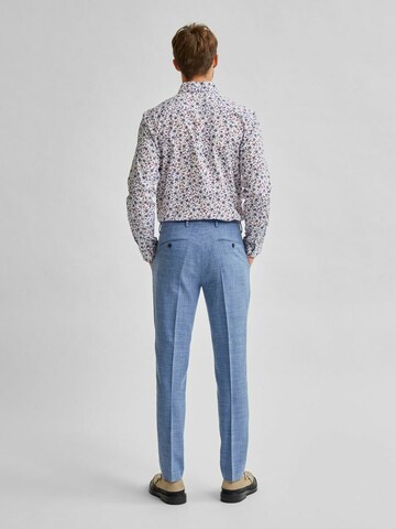 Coupe slim Pantalon à plis 'Oasis' SELECTED en bleu