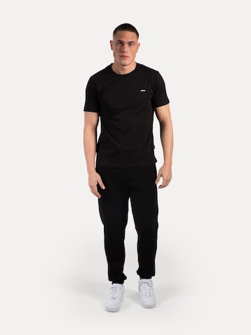 Effilé Pantalon Smilodox en noir