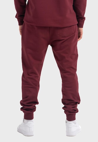 Loosefit Pantalon de sport 'Plain Basic' Oldskull en rouge