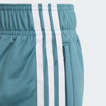 ADIDAS ORIGINALS Tapered Sports trousers 'Adicolor SST' in Blue