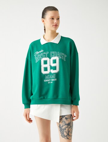 Koton Sweatshirt in Groen: voorkant