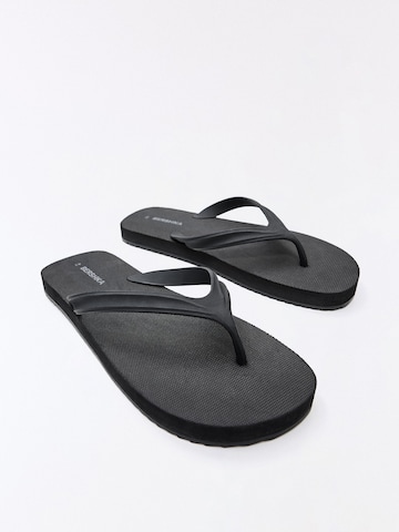 Bershka T-bar sandals in Black