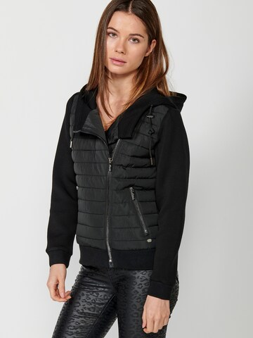 KOROSHI Välikausitakki värissä musta