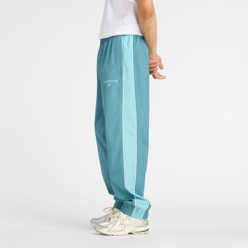 new balance Wide Leg Sporthose 'Trackside' in Blau