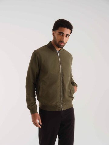 ABOUT YOU x Kevin Trapp Between-season jacket 'Robin' in Green