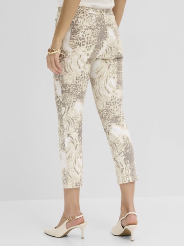 Slimfit Pantaloni di bonprix in beige