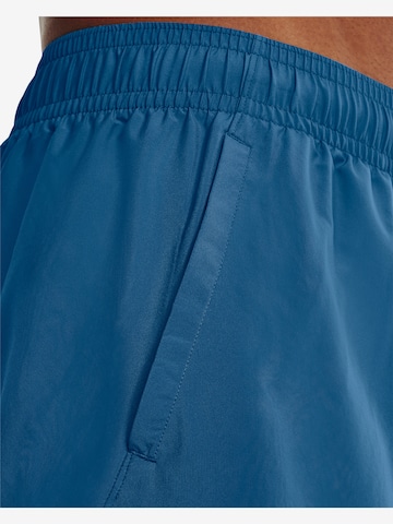 Regular Pantaloni sport de la UNDER ARMOUR pe albastru