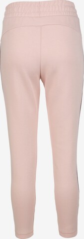 Tapered Pantaloni sportivi di PUMA in rosa