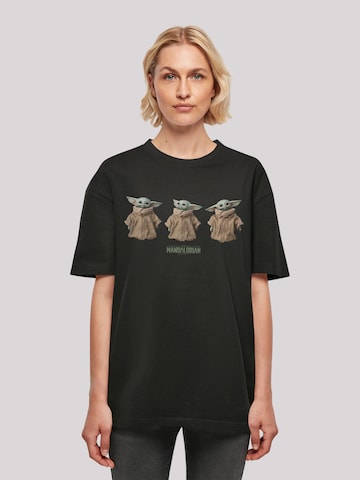 F4NT4STIC Oversized shirt 'Star Wars The Mandalorian The Child Poses' in Zwart: voorkant