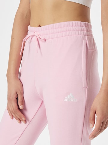 ADIDAS SPORTSWEAR Loose fit Sports trousers 'Essentials French Terry Logo' in Pink