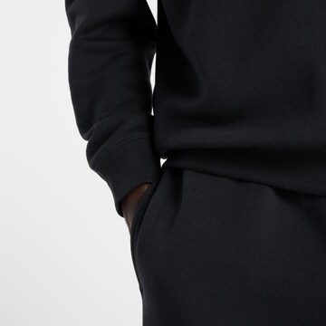 T-Shirt 'Reimagined Fleece Crew' new balance en noir