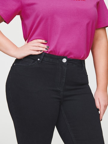 Rock Your Curves by Angelina K. Skinny Jeans in Schwarz