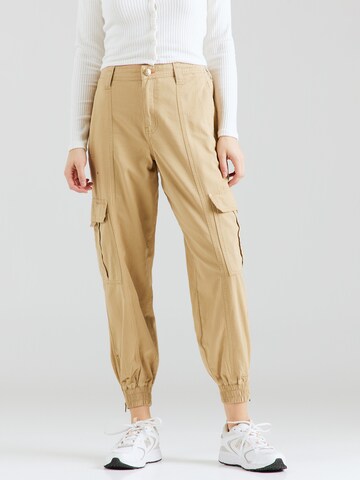 River Island Tapered Cargo Pants in Beige: front