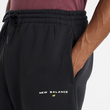 Effilé Pantalon new balance en noir