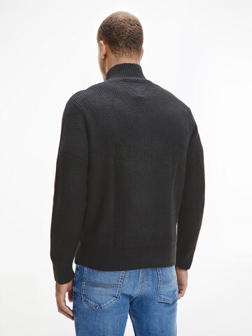 Pull-over Tommy Jeans en noir