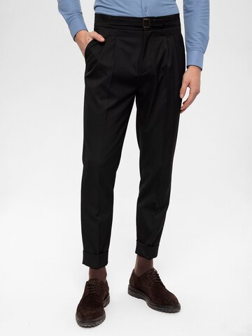 Antioch Tapered Pleat-front trousers in Black