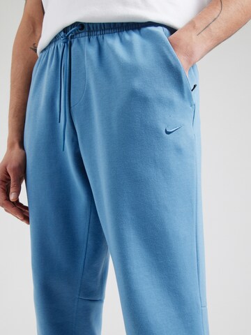 NIKE Конический (Tapered) Спортивные штаны 'PRIMARY' в Синий