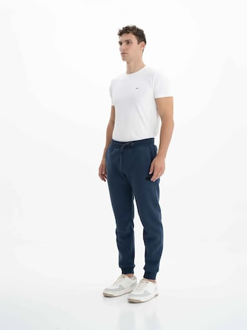 Arma Regular Trousers in Blue