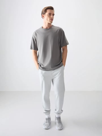 Tommy Life T-Shirts in Grau