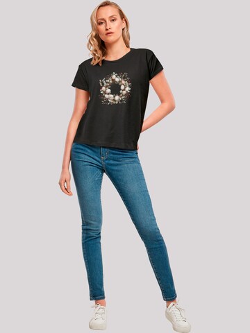 F4NT4STIC Shirt 'Osterkranz Eierkranz Blumenring' in Zwart