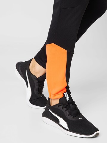 PUMA Slimfit Sporthose in Schwarz