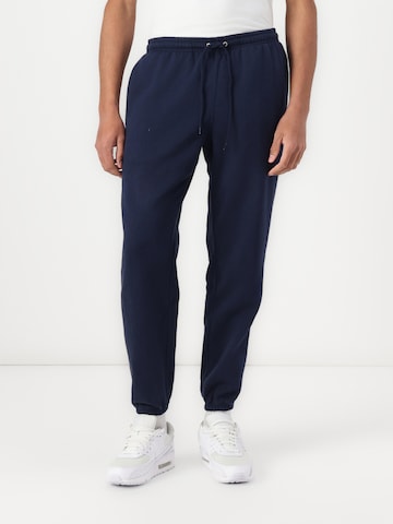 Nike Sportswear Tapered Trousers 'CLUB' in Blue: front