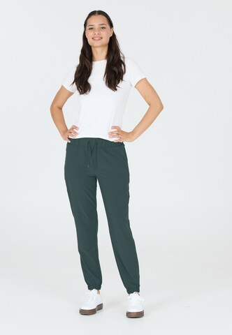 Athlecia Tapered Sportbroek 'Austberg' in Groen