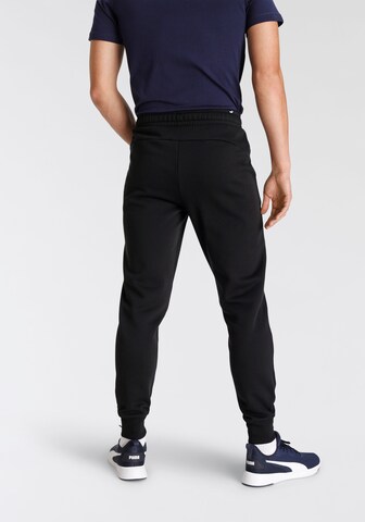 PUMA Tapered Sporthose 'Essentials' in Schwarz