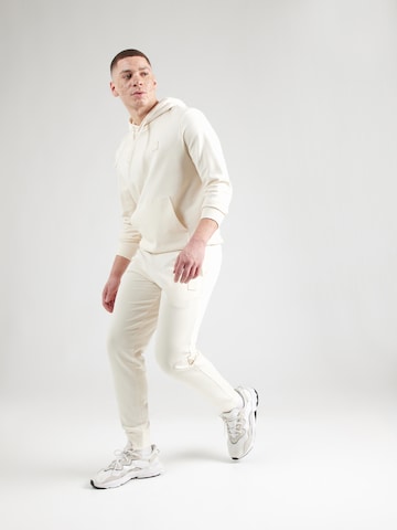 balta PUMA Siaurėjantis Sportinės kelnės 'ESS'