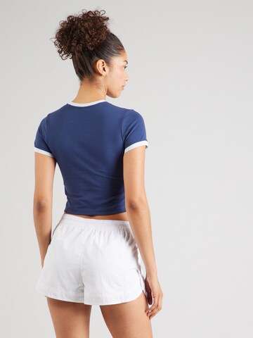 Nike Sportswear - Camisa em azul