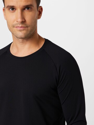 T-Shirt fonctionnel Casall en noir
