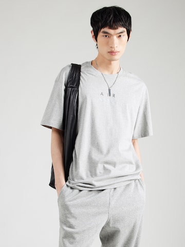 Maglietta 'AIR' di Nike Sportswear in grigio: frontale