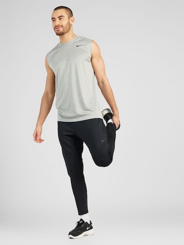 NIKE Tapered Sportbroek 'DFADV AXIS' in Zwart