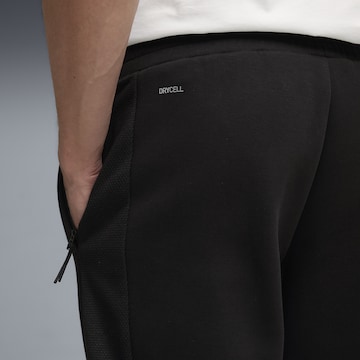 PUMA Regular Workout Pants 'Evostripe' in Black