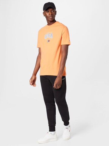 Tommy Jeans - Camiseta 'Classic' en naranja