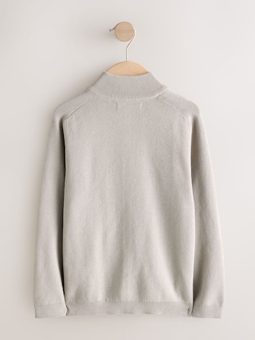 Next Pletená bunda – béžová