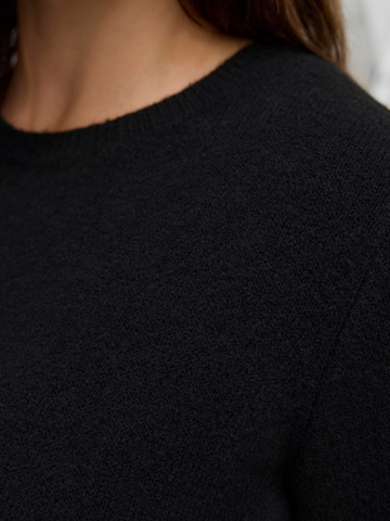 Vero Moda Curve - Vestido de punto 'VMCBoom' en negro
