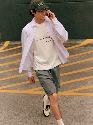 Pull&Bear Lużny krój Spodnie w kolorze szary