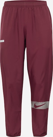 NIKE Tapered Workout Pants 'FLSH CHLLGR' in Red: front