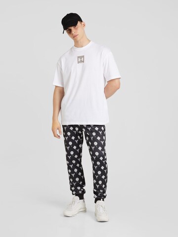 UNDER ARMOUR - Camiseta funcional en blanco